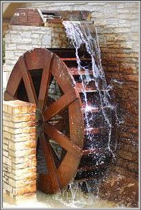Water wheel powering a mill.  From www.sxc.hu