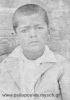 Φωτογραφία biog_01. Αλέκος Σουλιμιώτης, στην φωτογραφία ήταν 7 ετών. Ημερομηνία Φωτογραφίας 20 Μαΐου 1938. Το έτος αυτό όπως γράφει στο πίσω μέρος της φωτογραφίας είχε σπάσει το χέρι του.
